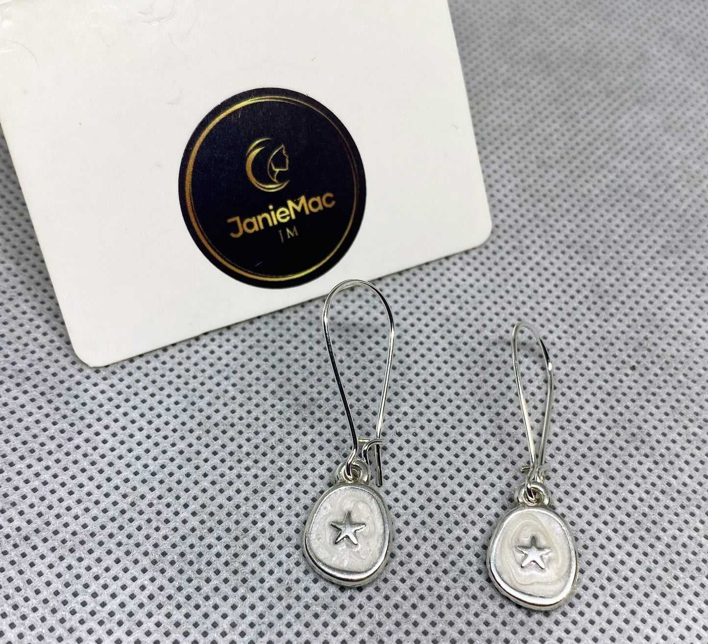 White star charm silver earrings