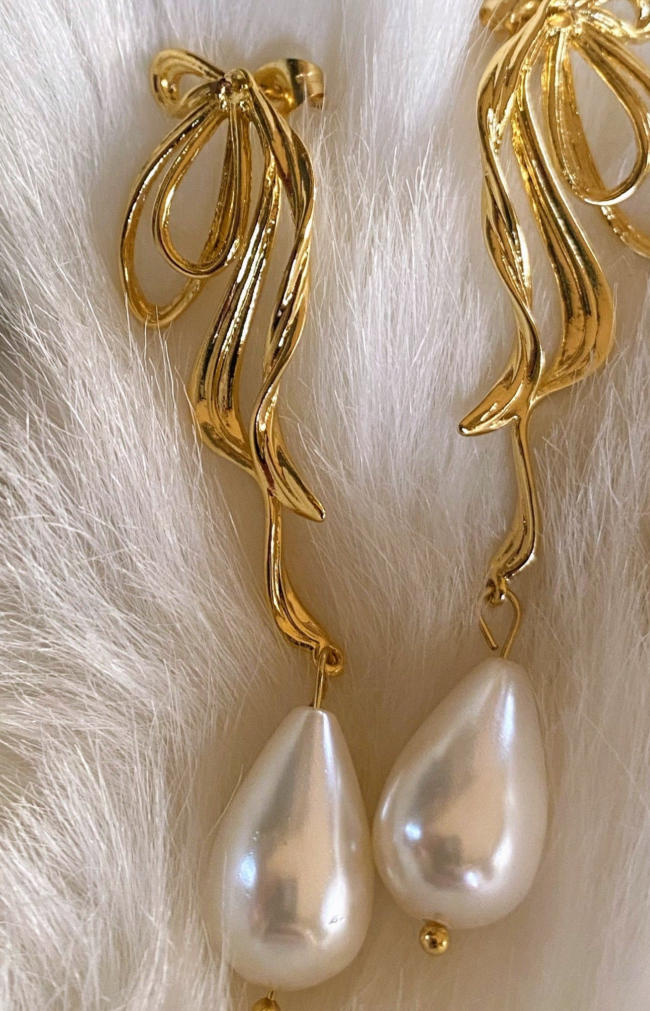 Left and right Bow Earrings